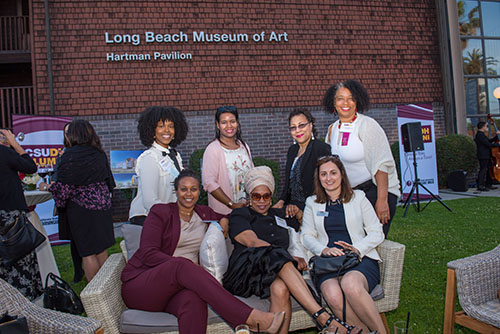 Alumni gather for a photo at the Long Beach Museum of Art