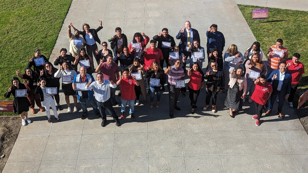 group of students with certificates