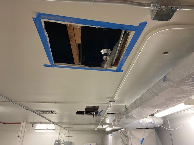 Hole in ceiling where air vents will be installed